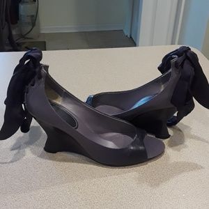 Purple string up wedge shoe